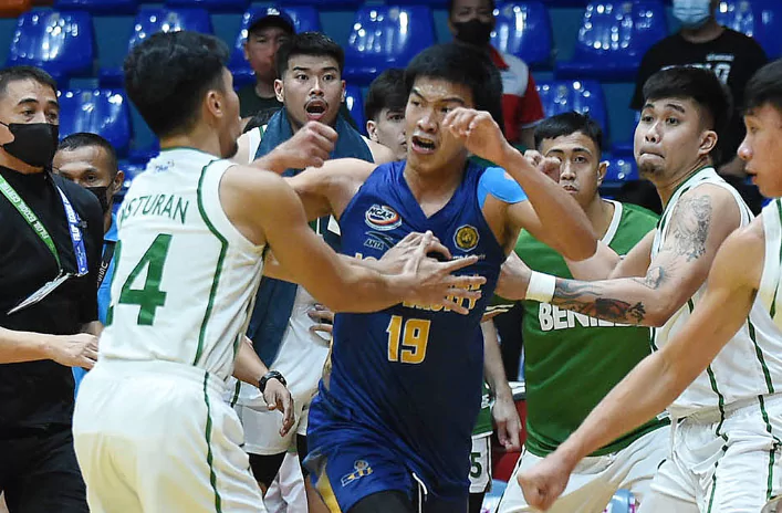 punching scandal of john amores in ncaa